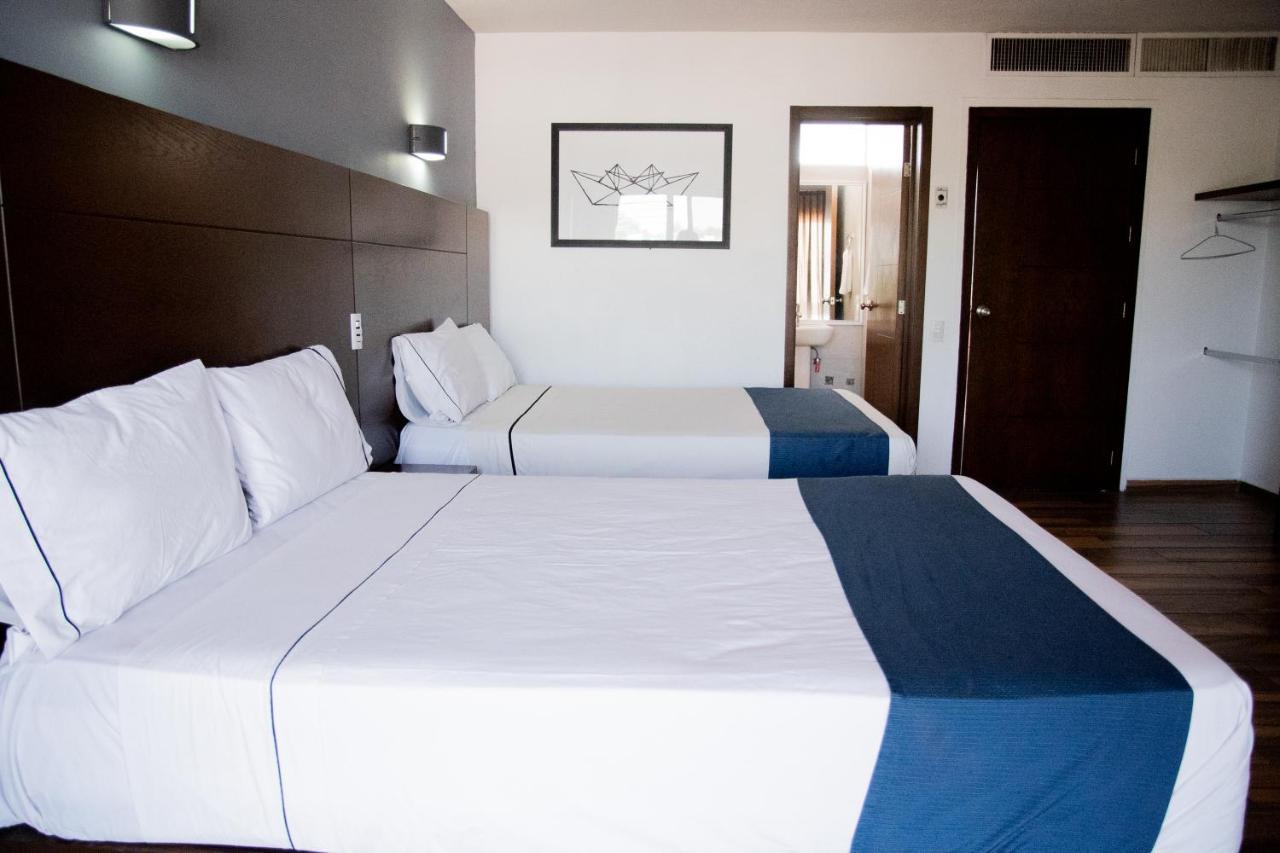 Hotel Expo Plaza Business And Family Guadalajara Zapopan Bagian luar foto